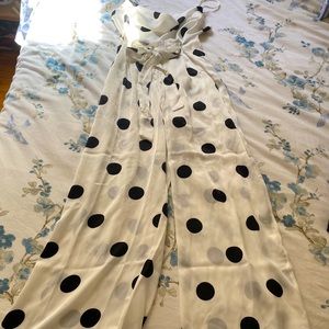 White polka dot jumpsuit w/ cowl neck.